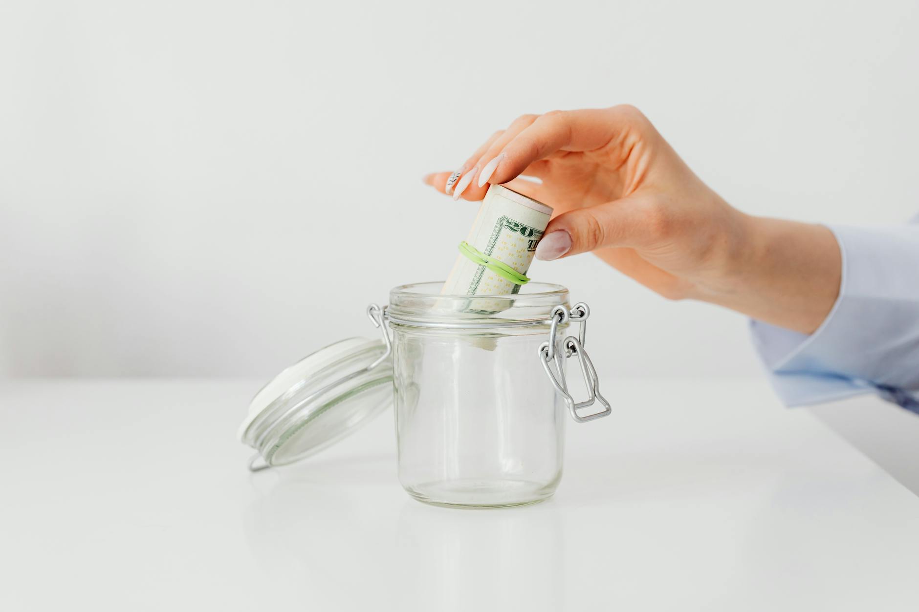 A frugal living visual built around recurring monthly savings